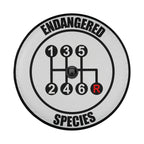 Endangered Species gear shift spare tire cover rear angle view on parked SUV outdoors