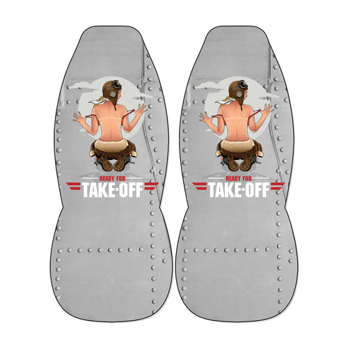 a pair of gray metal seat covers with a graphic design depicting a woman in a pilot's uniform. The text "READY FOR TAKE-OFF" is prominently displayed on the seat covers.