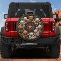 Teddy Bear Wreath spare tire cover on red Bronco circular tan and brown plush bear ornament design