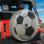 Soccer ball spare tire cover flat-lay product photo showing realistic black and white panels
