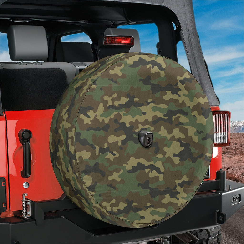 Woodland camo tire cover flat round front view showing traditional military green and brown blotch pattern
