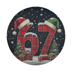 A circular image featuring a large number '67' made of plaid fabric, with two Santa hats on top of it, surrounded by Christmas trees and presents.