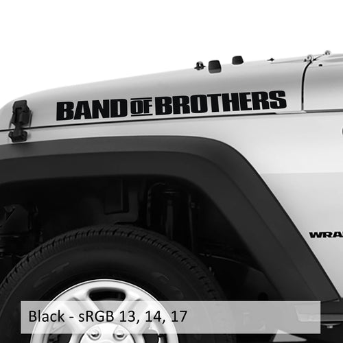 Bold black BAND OF BROTHERS hood-side decal applied to a white Jeep Wrangler with sRGB 13 14 17 color swatch