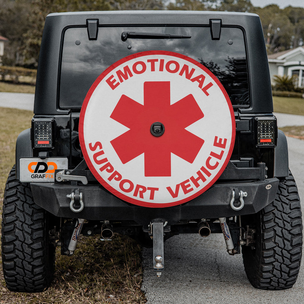 Emotional Support Vehicle spare tire cover with star of life emblem mounted on Jeep Wrangler