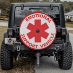 Emotional Support Vehicle spare tire cover with star of life emblem mounted on Jeep Wrangler