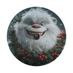 Flat round Christmas tire cover featuring a smiling yeti with red holly berry wreath collar