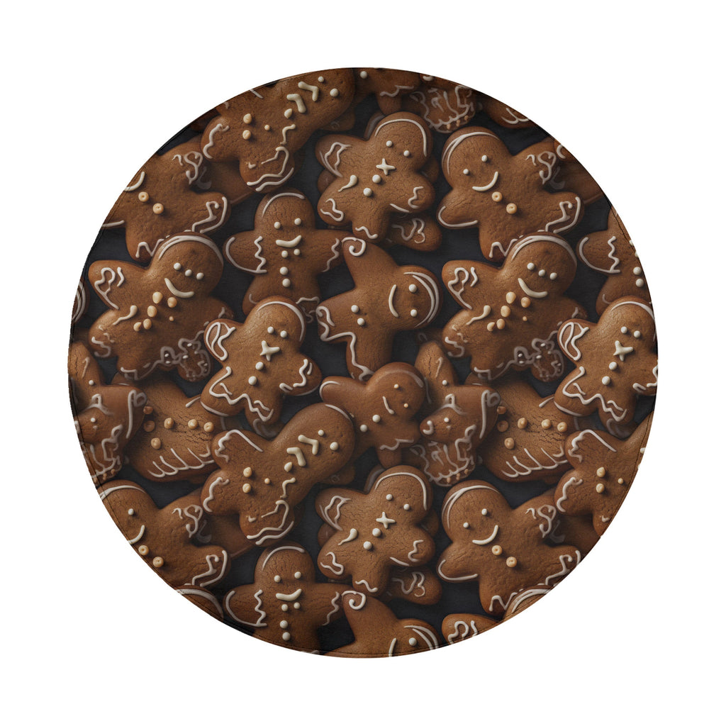 Round gingerbread cookies tire cover on white showing scattered iced brown cookie figures dark base