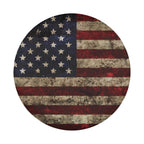 Rustic American flag spare tire cover studio close-up of weathered stars and stripes without camera cutout