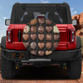 Chocolate Wheel spare tire cover on red Bronco displaying assorted heart-shaped chocolates design