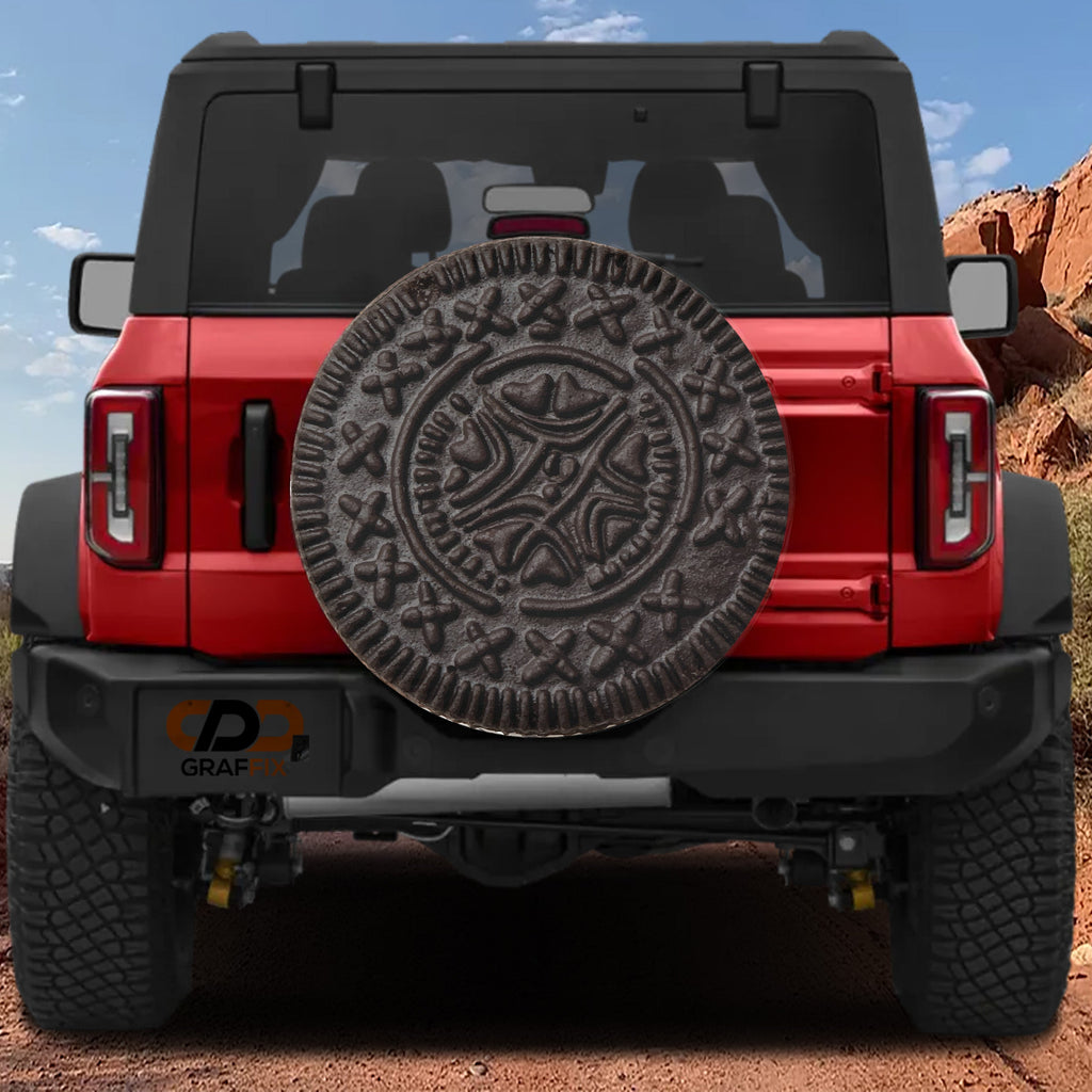 Choco Creme Cookie spare tire cover on a red Jeep Wrangler showing the chocolate sandwich cookie illustration in full