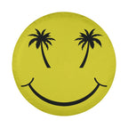 Palm Smiles tire cover on red Jeep Wrangler rear gate showing yellow happy face with palm tree eyes