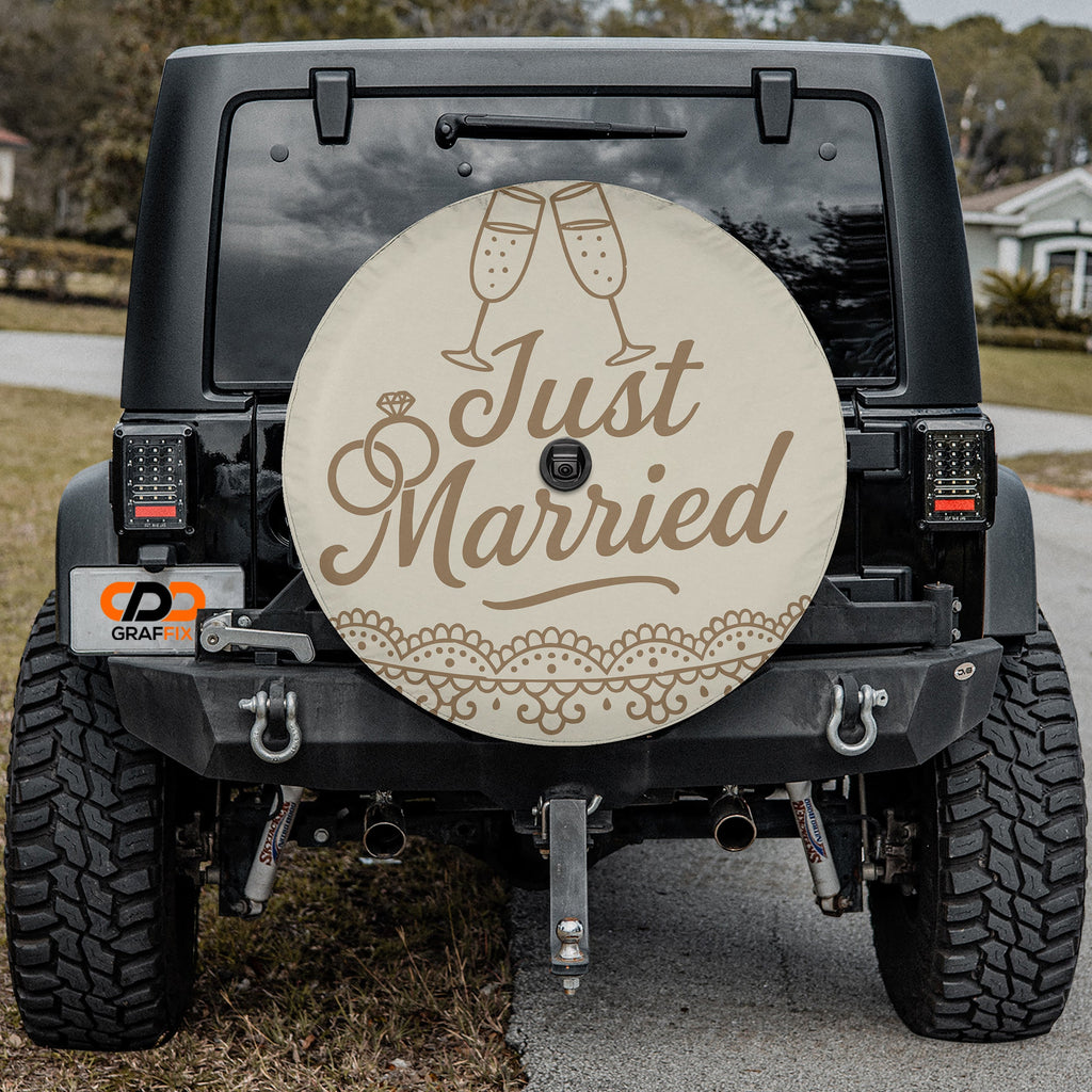 Just Married spare tire cover flat view with toasting glasses gold script wedding band