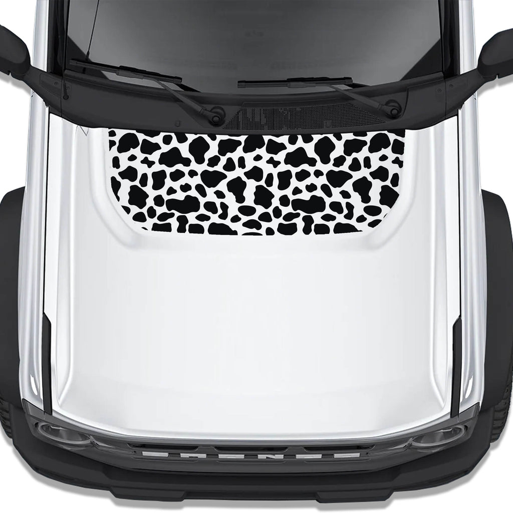 Cow Print blackout hood vinyl decal shown installed on the hood of a 2021+ Ford Bronco SUV