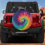Cool tone blue pink tie-dye spiral tire cover round product render with center camera cutout opening