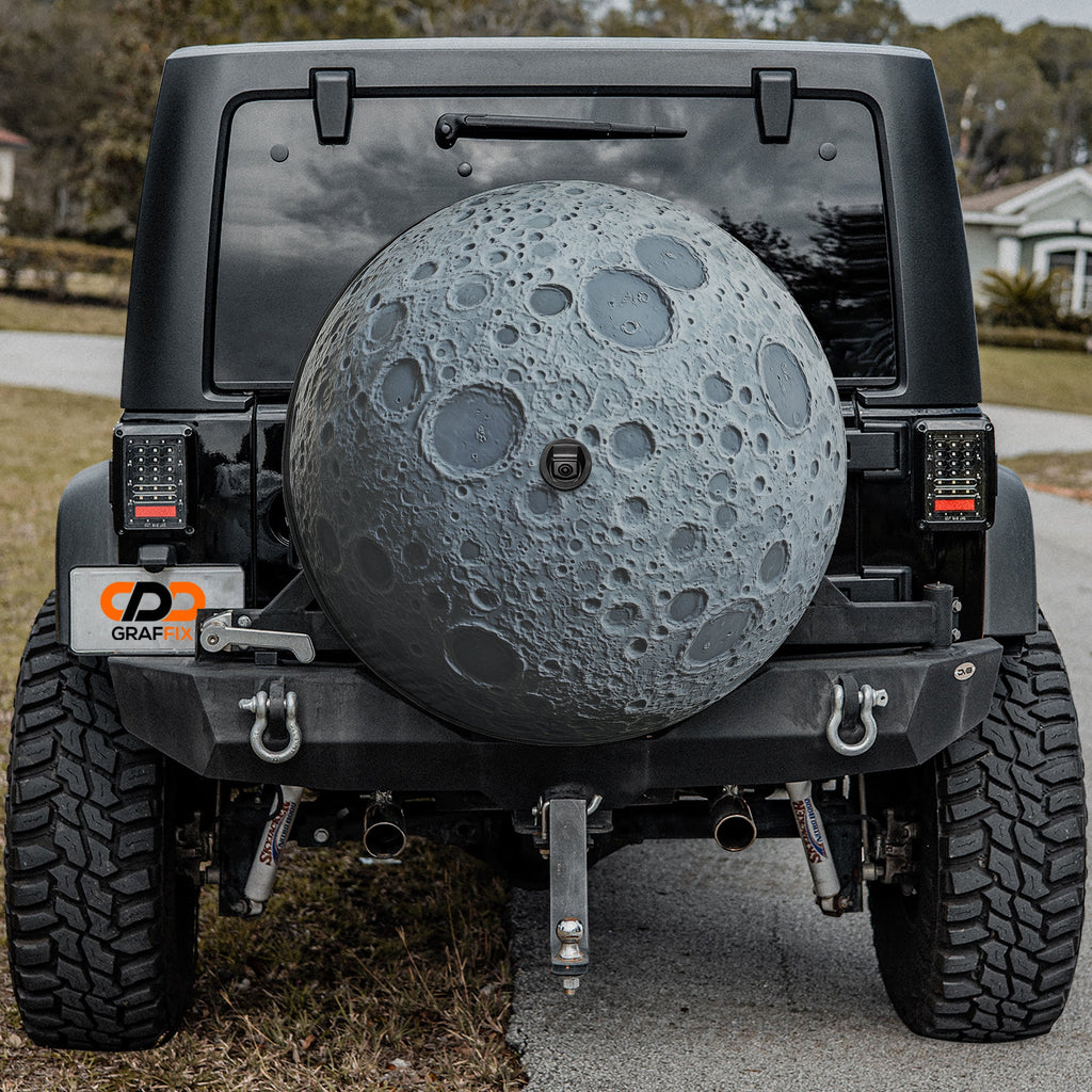 Dark Side of the Moon spare tire cover flat product view with realistic gray moon surface