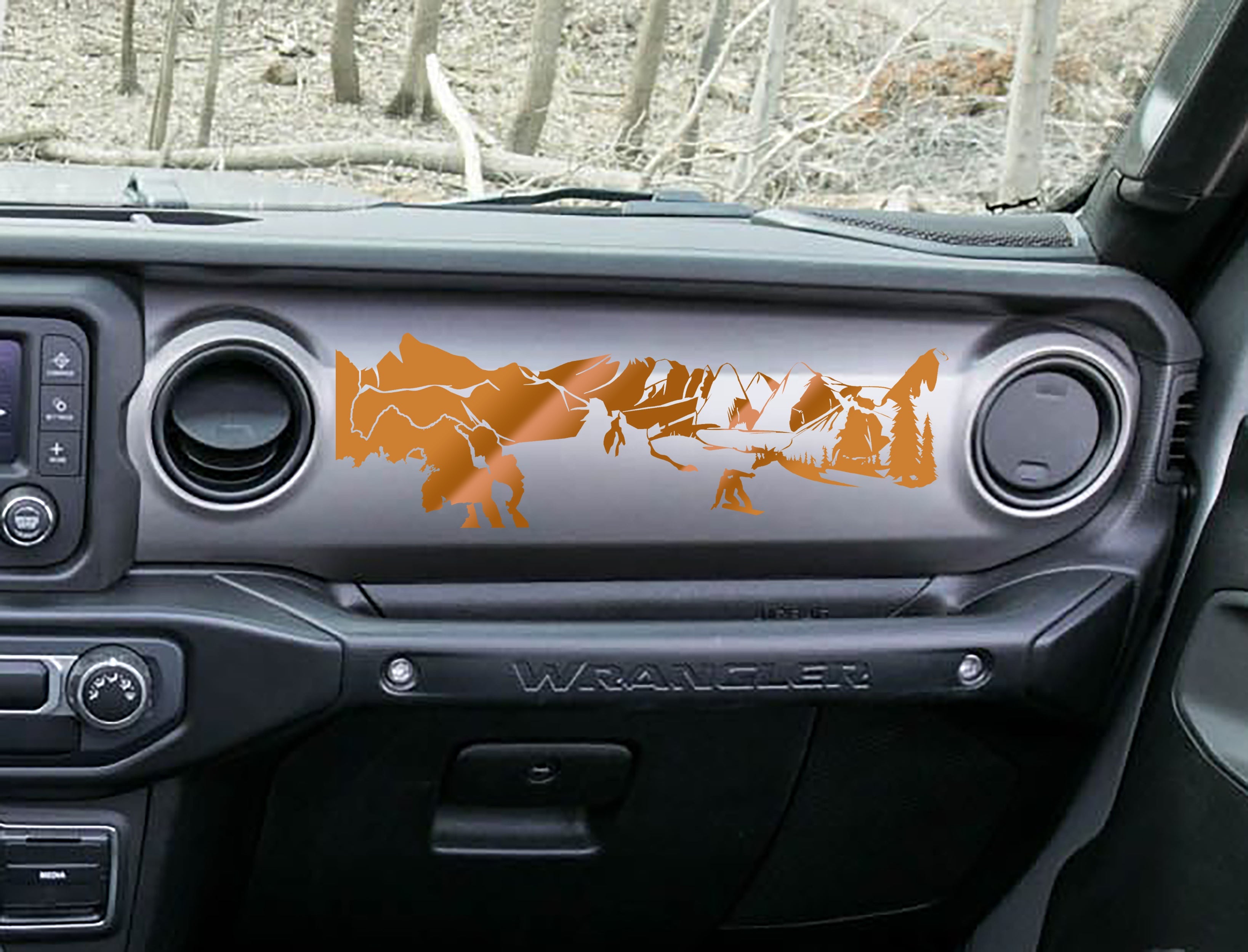Copper snowboarder mountain dashboard decal on Jeep JL, snowboarder peaks pines artwork shown