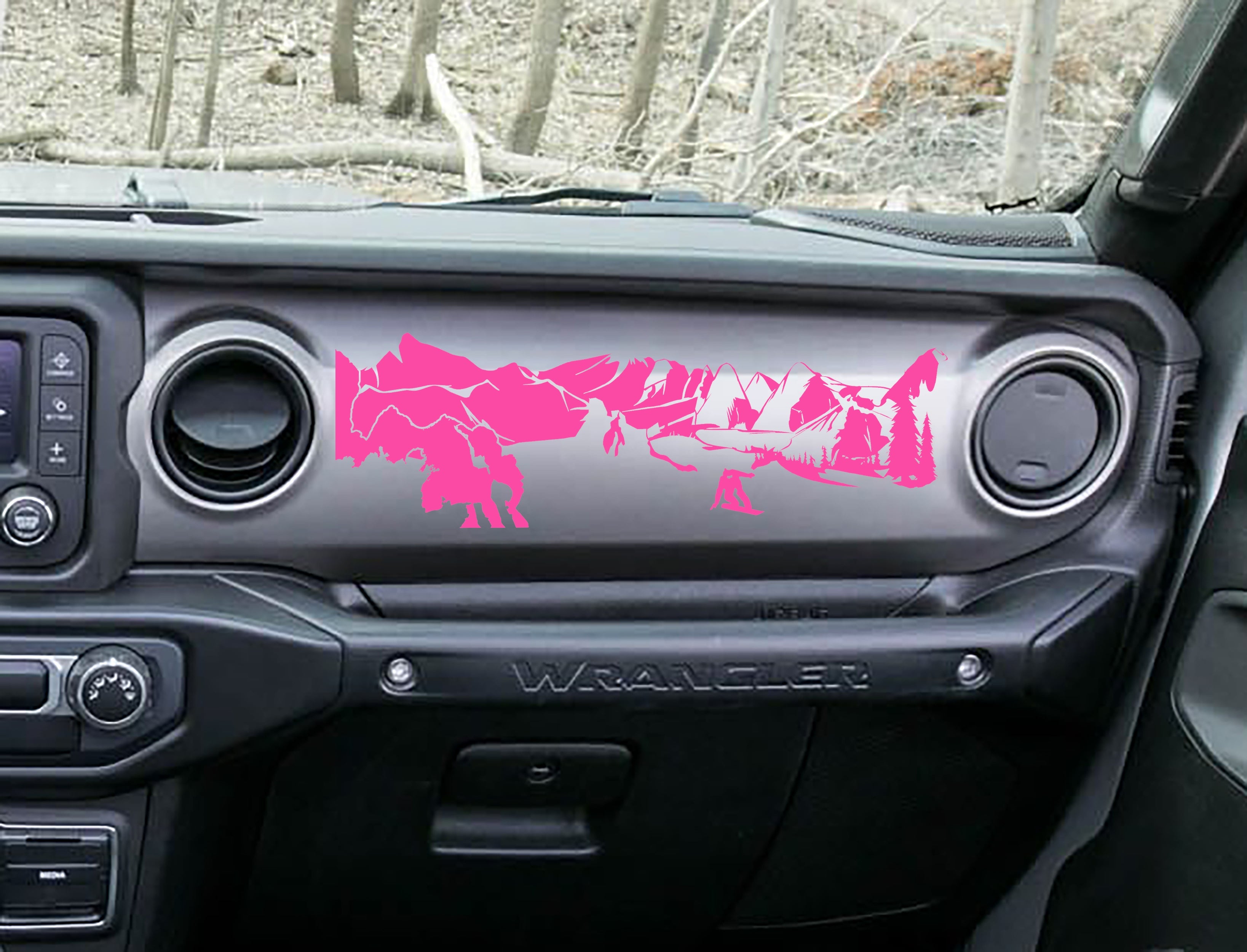 Pink snowboarder mountain dashboard decal on Jeep JL Wrangler, snowboarder peaks pines artwork