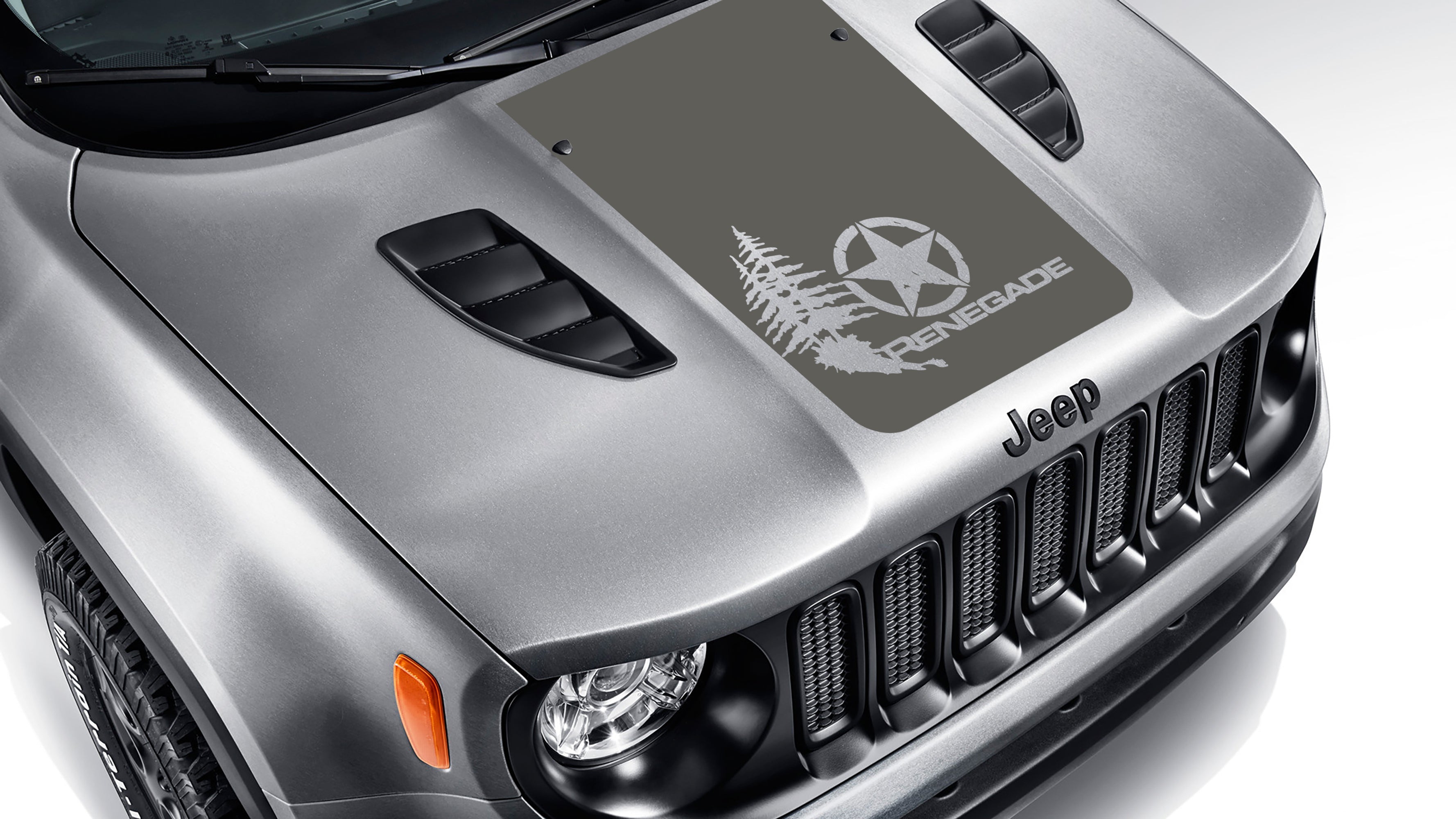 Dark grey distressed star with pine trees blackout hood decal on silver Jeep Renegade hood