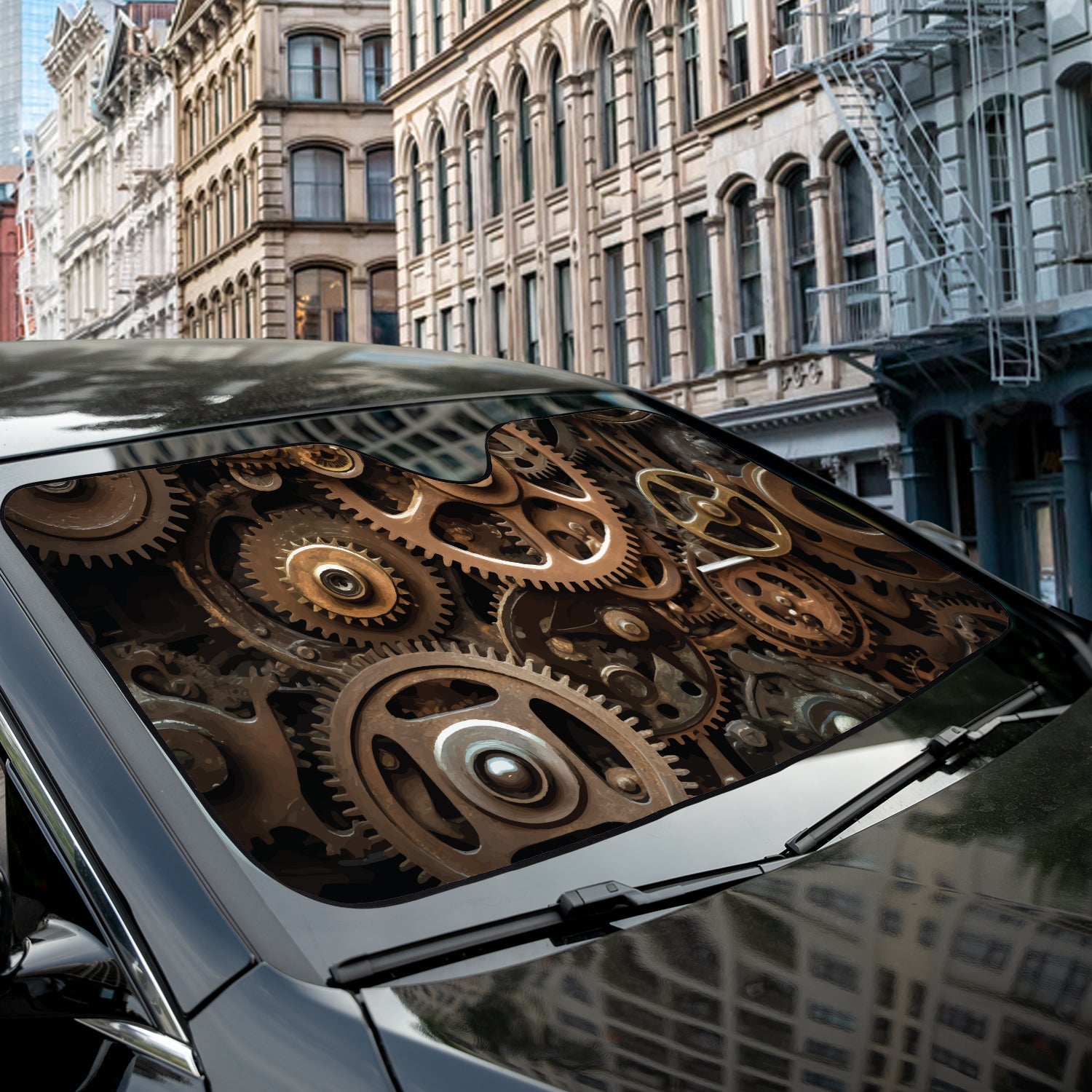 Gears and Sprockets accordion sunshade close-up installed on a dark sedan windshield exterior detail view
