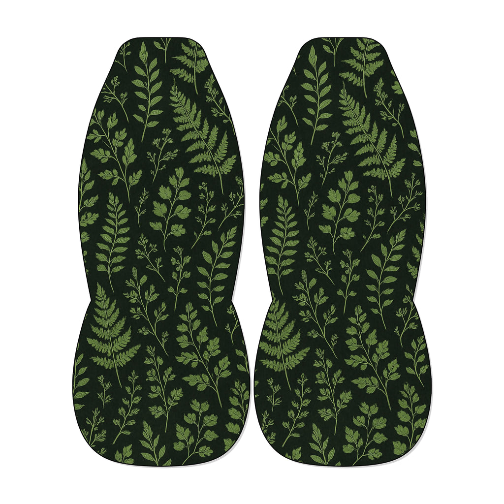 two identical car seat covers with a repeating pattern of green leaves and branches.