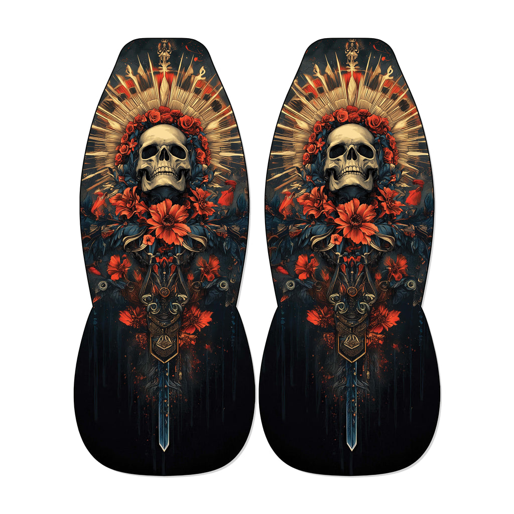a pair of dark-colored shoes with a skull design and floral elements on the sides.