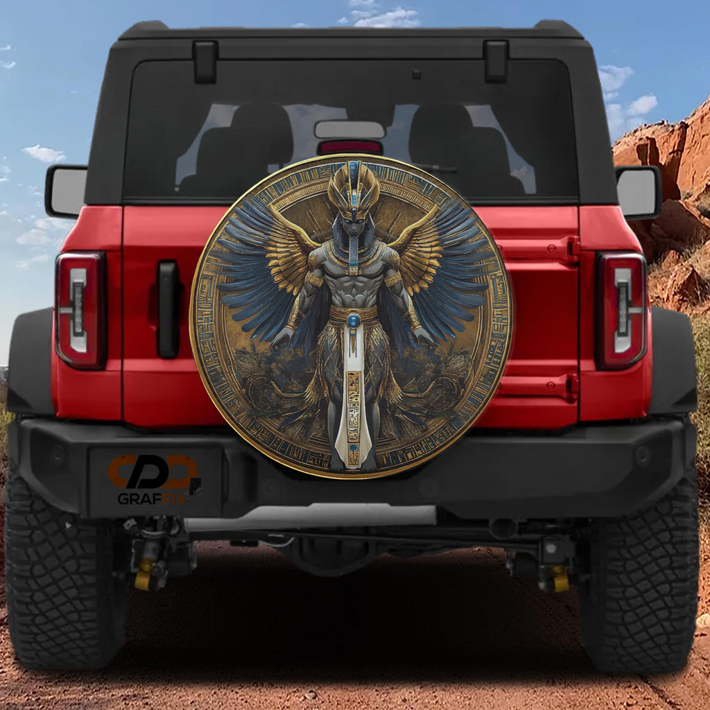 Egyptian pharaoh winged deity spare tire cover on a black Jeep Wrangler showing GRAFFIX rear bumper sticker