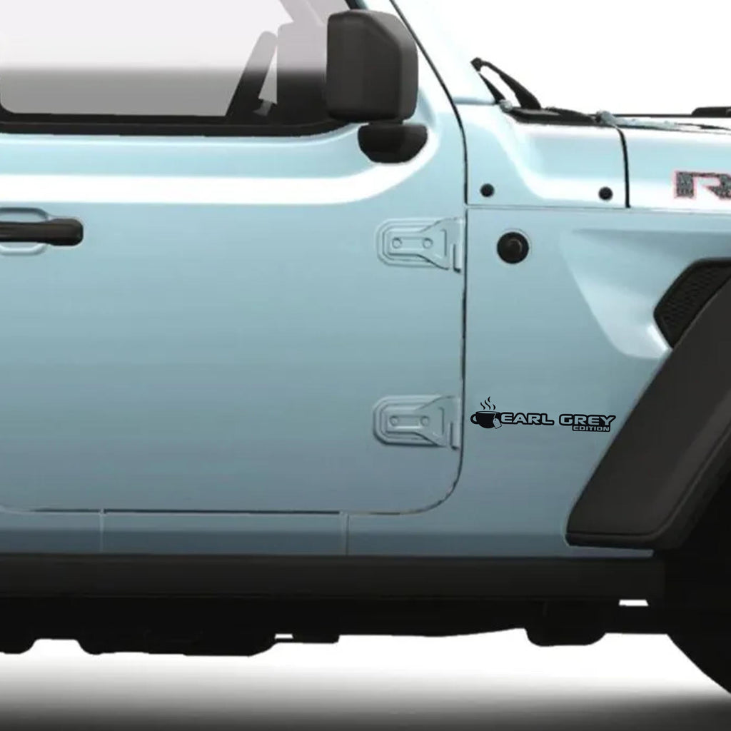Earl Grey Edition fender decal black teacup logo installed on light blue Jeep Wrangler JL door hinge area