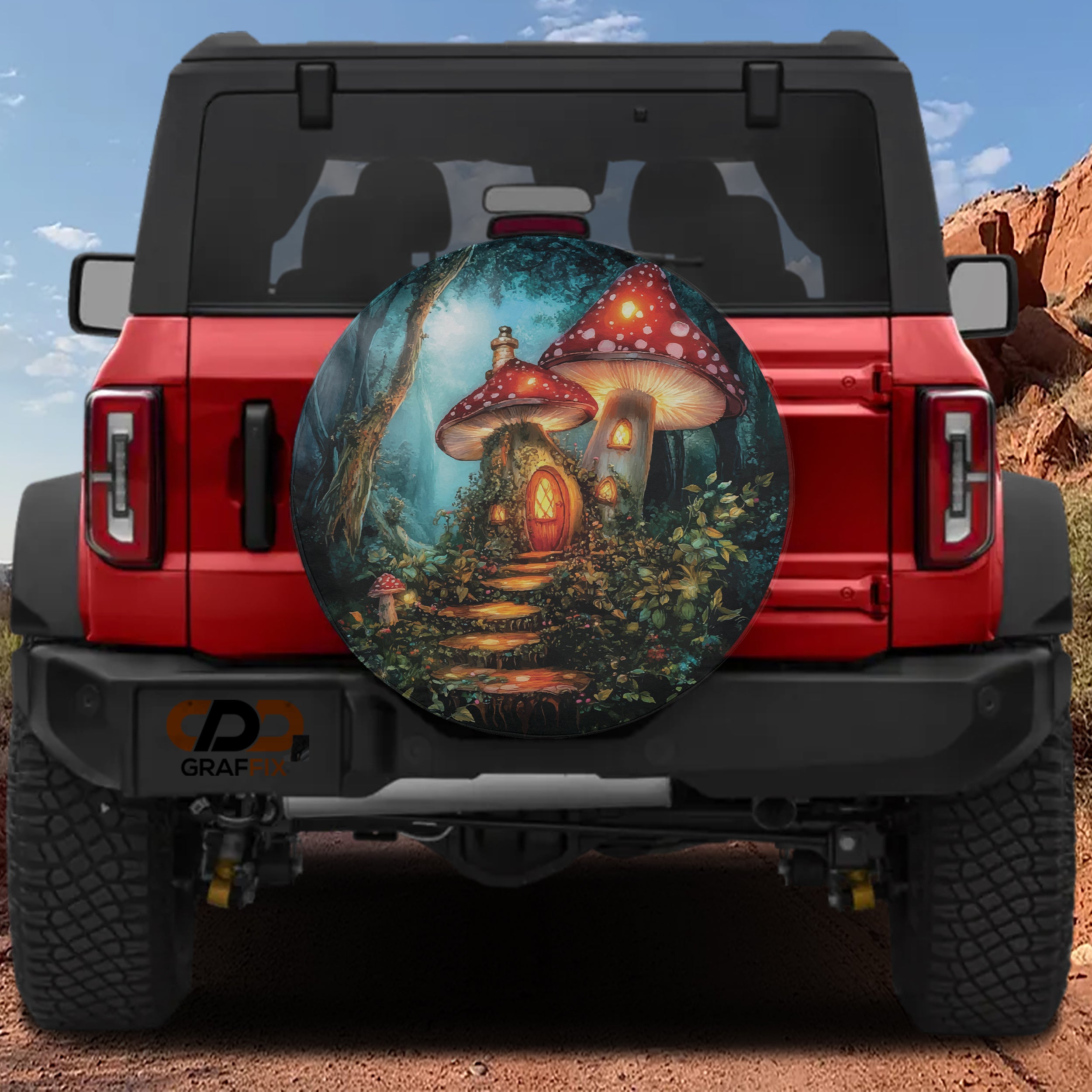 Enchanted Mushroom Cottage spare tire cover on a red Jeep Wrangler with the magical forest mushroom house art