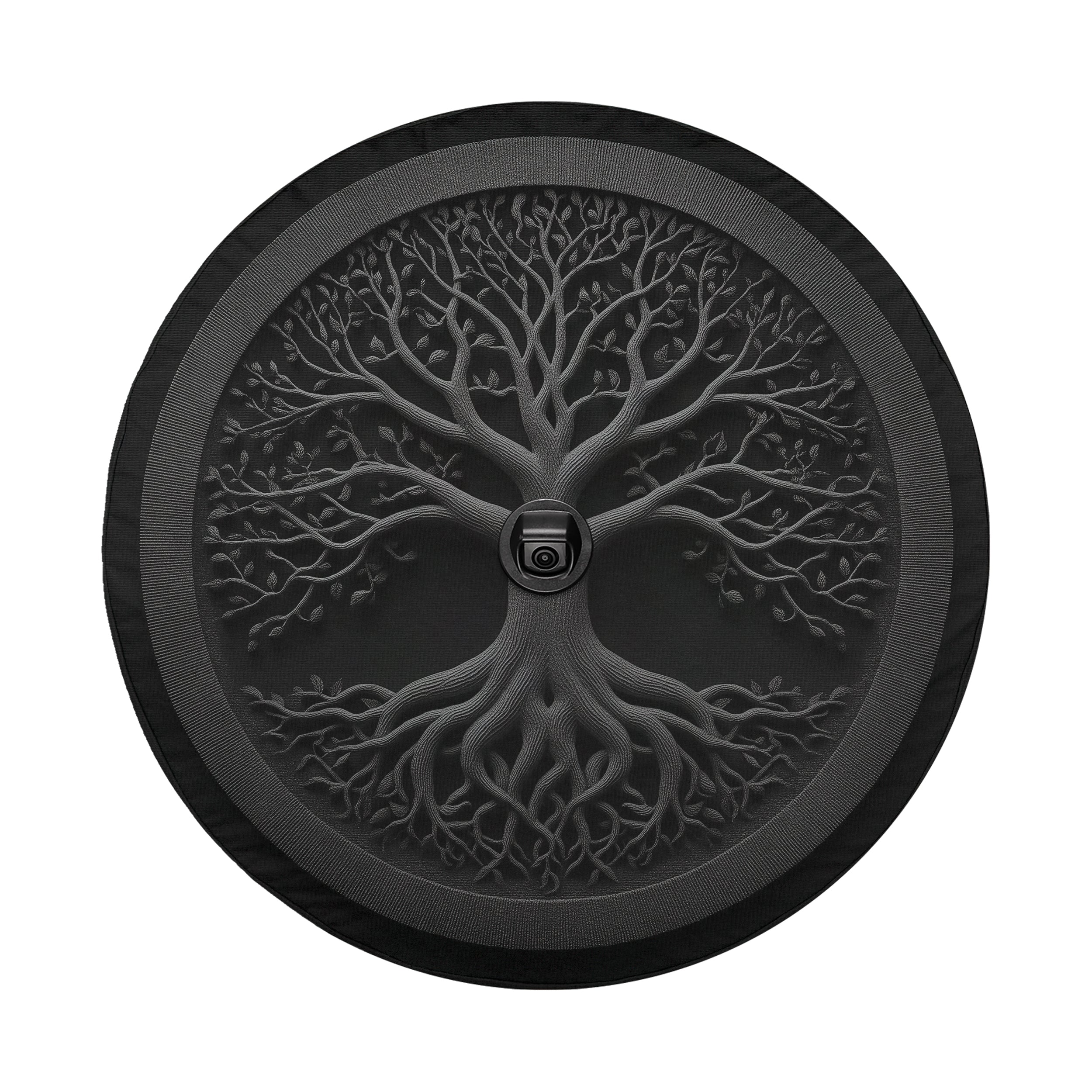 a circular design with a tree-like pattern, including a trunk and branches, encircled by a black border.