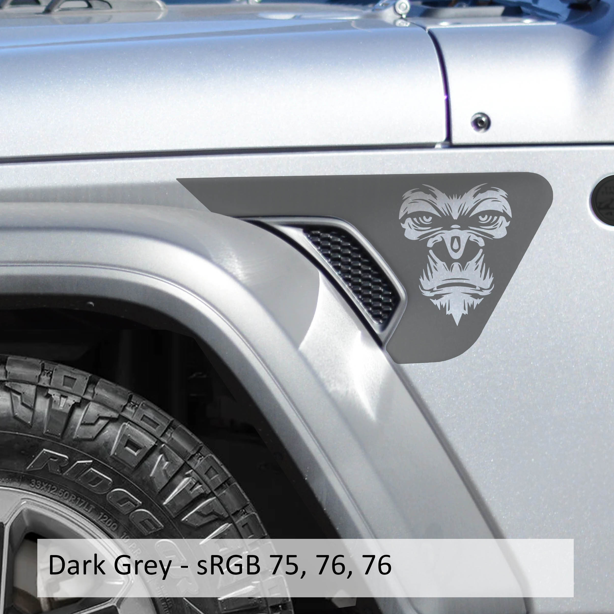 Dark gray gorilla face billet fender vent decal on silver Jeep Wrangler JL fender