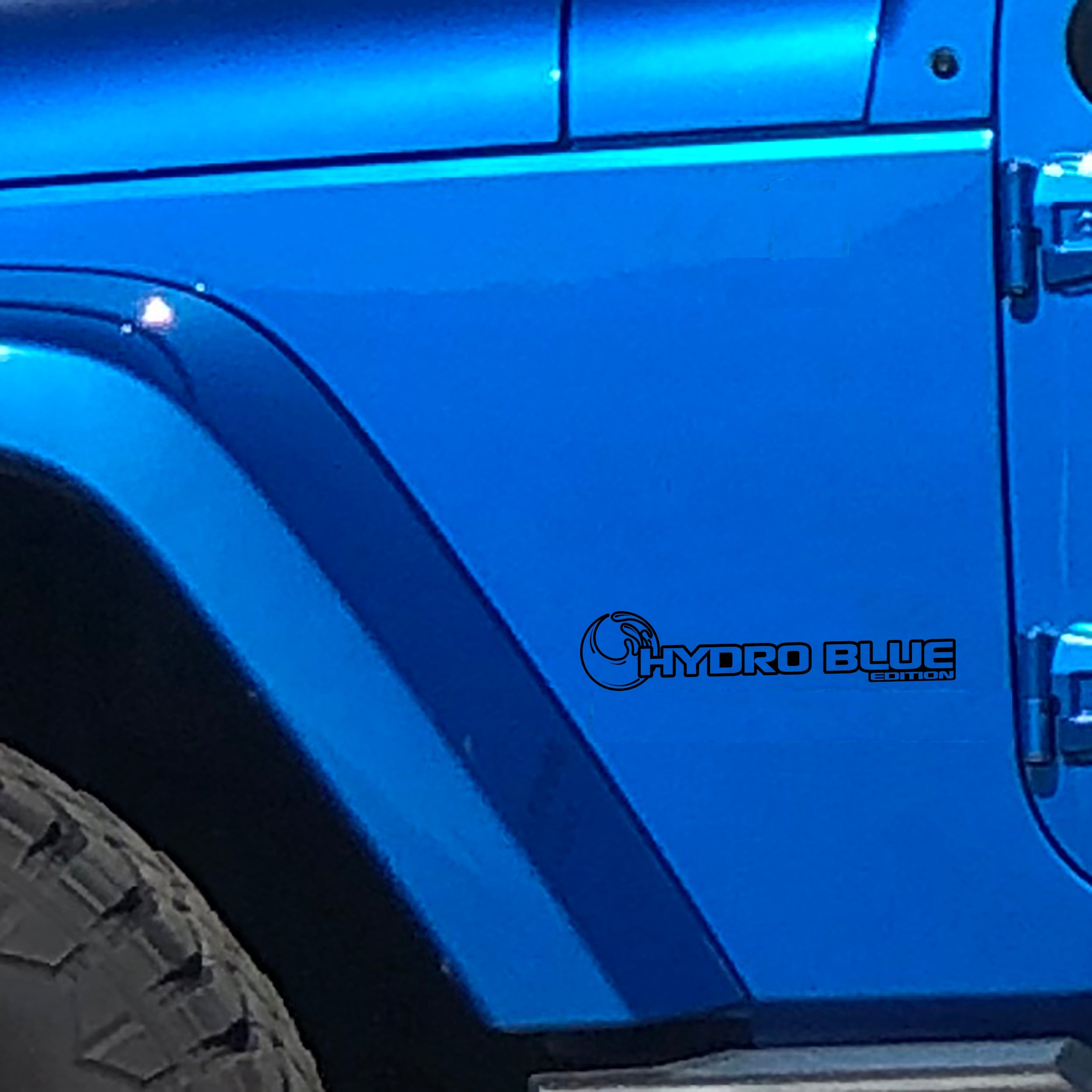 Black Hydro Blue Edition wave fender decal pair installed on Jeep Wrangler JL Gladiator JT cowl