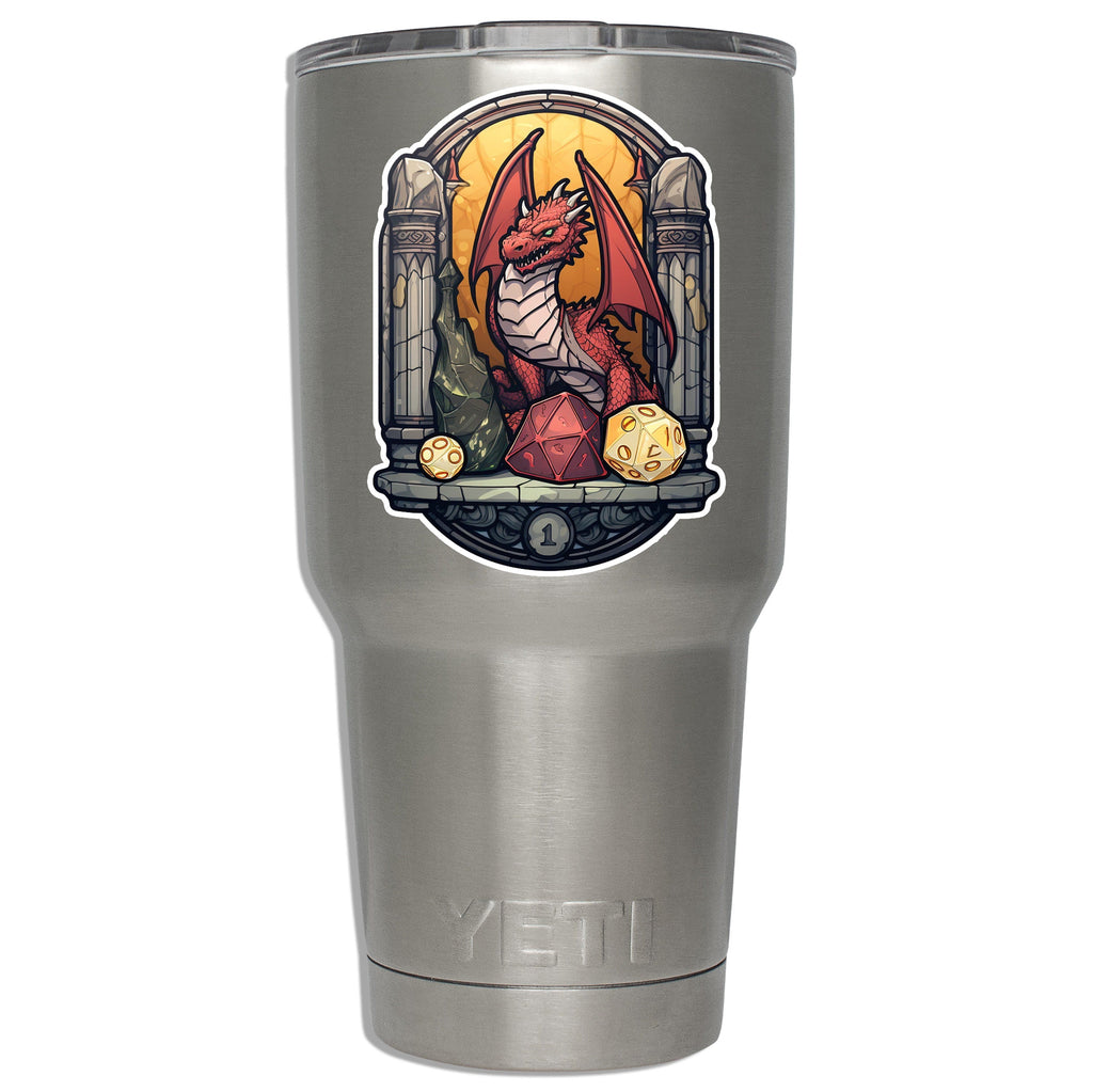 Red dragon shrine sticker fixed to a stainless YETI tumbler showing the printed decal scale on metal drinkware