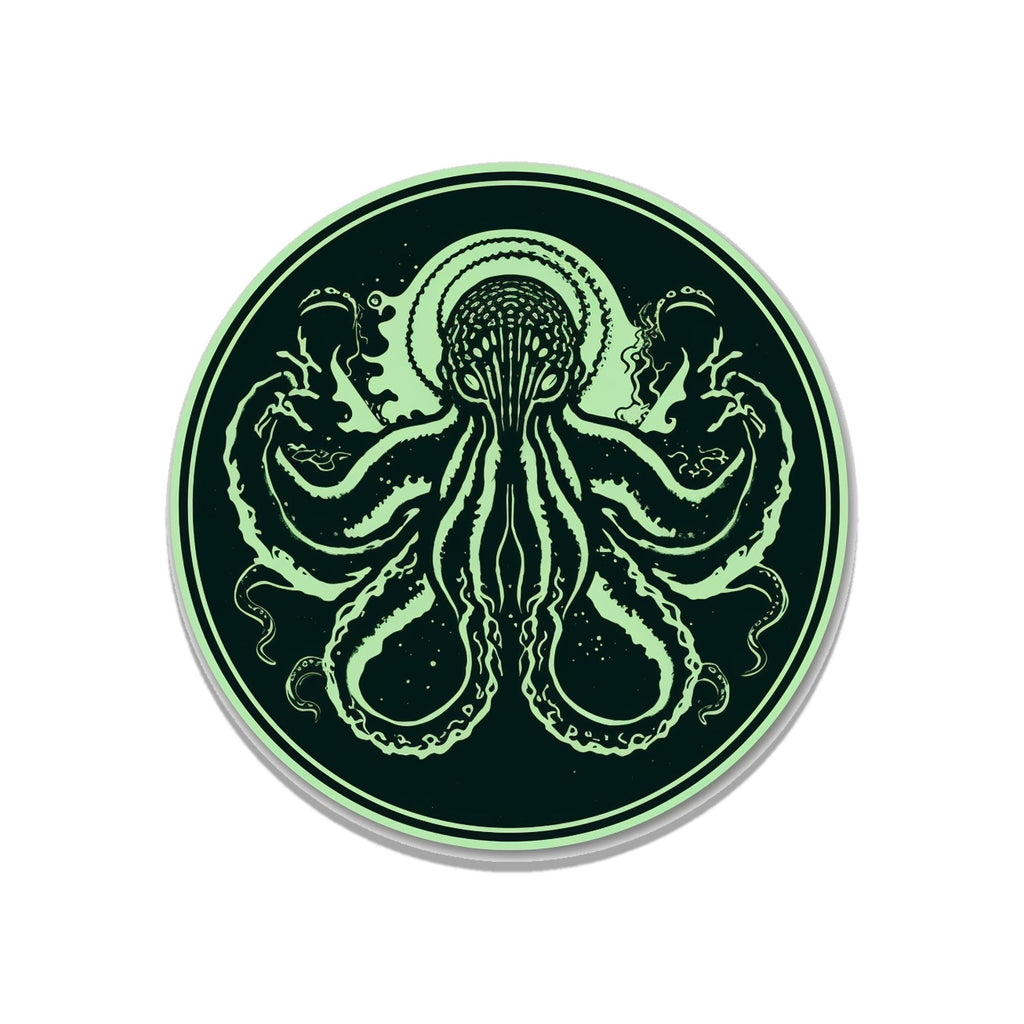 Minimalist Cthulhu sticker with mint green octopus silhouette in dark circular frame, two-tone art style