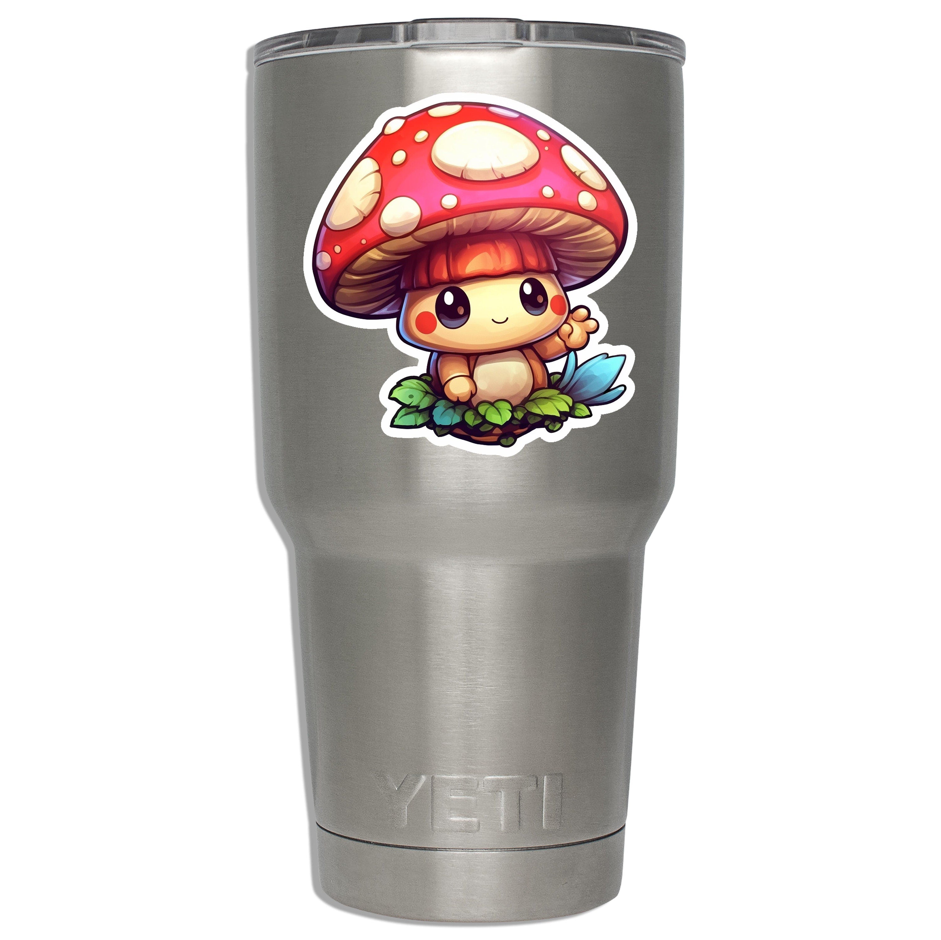 Cute cartoon winged mushroom decal mounted on a stainless YETI tumbler showing fit on insulated tumbler