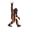 Rock On Sasquatch sticker with distressed American flag fill, bigfoot silhouette throwing horns hand sign