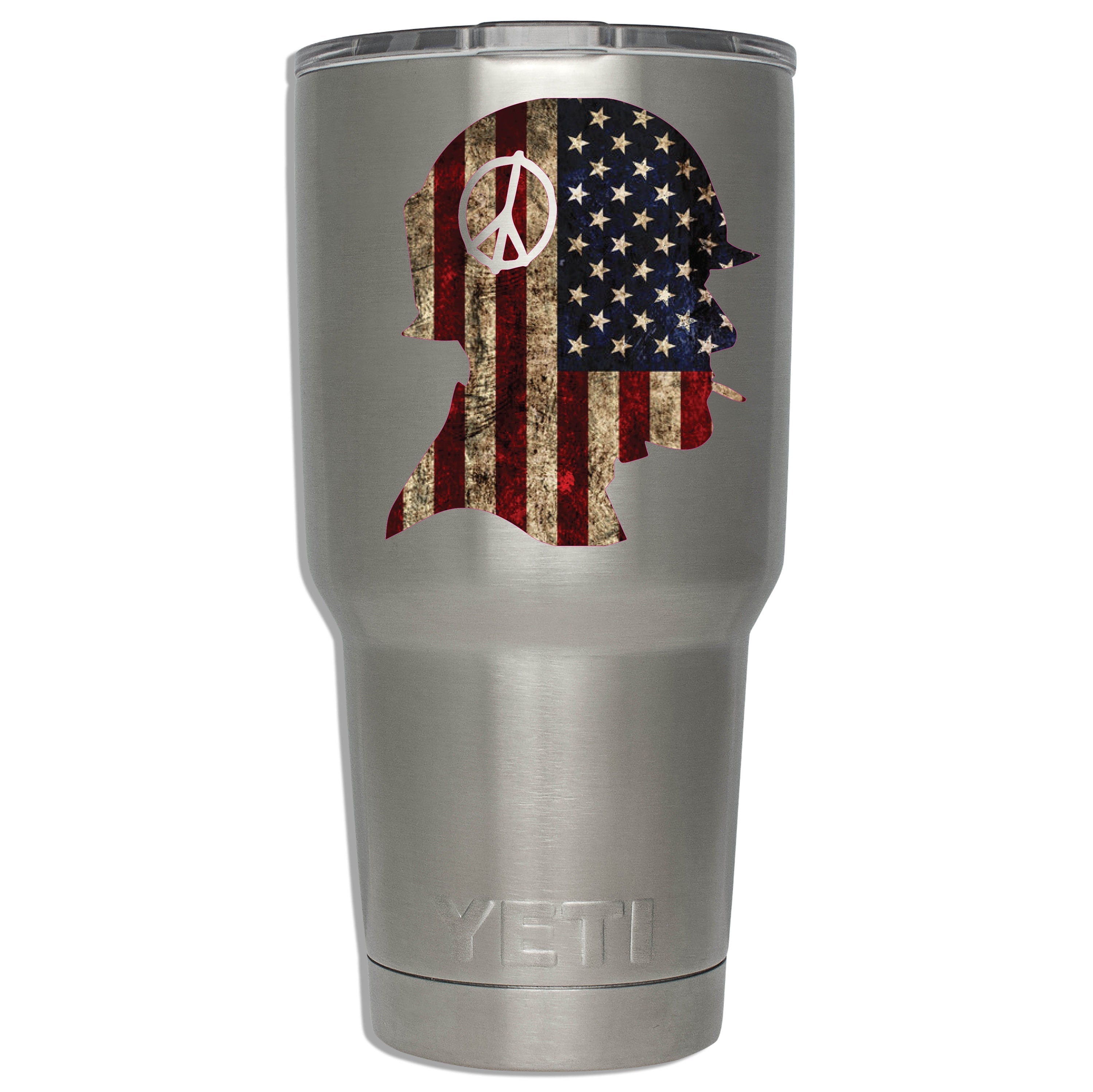 Rustic flag soldier helmet decal mounted on a stainless YETI tumbler showing scale on insulated drinkware