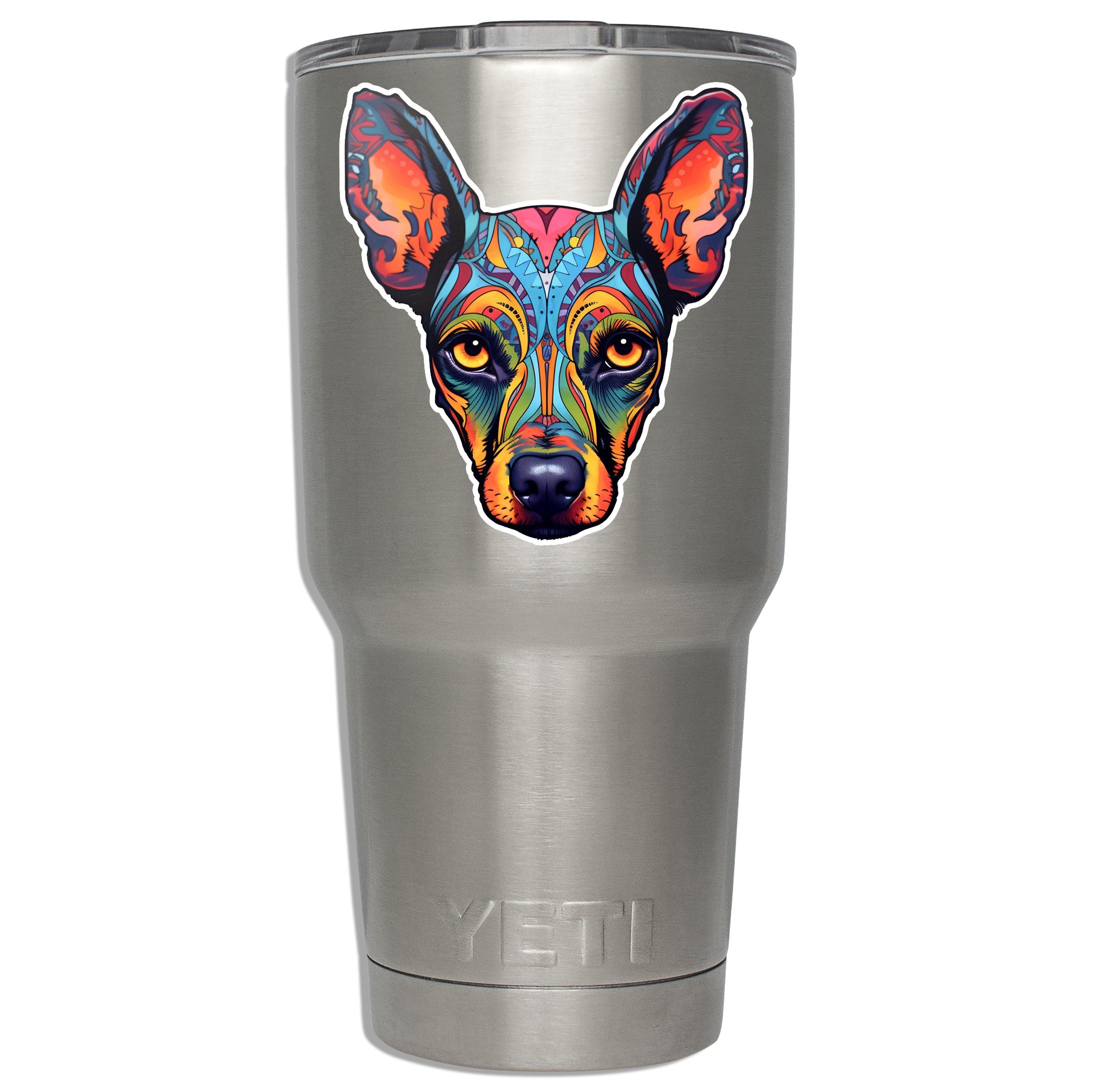 Colorful doberman sugar skull decal mounted on a stainless YETI tumbler showing size on insulated drinkware