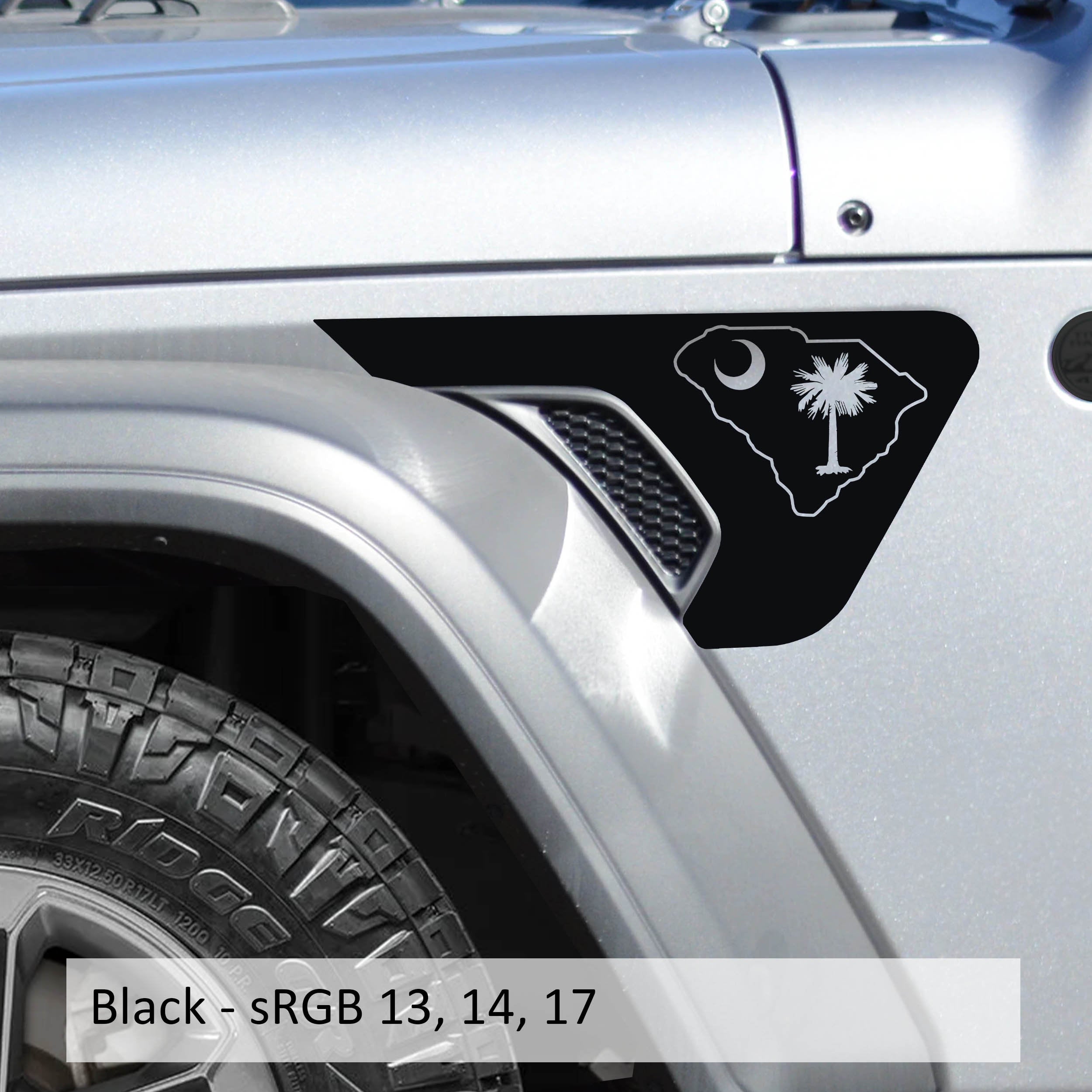 Black South Carolina state flag fender vent decal installed on silver Jeep Wrangler JL billet vent