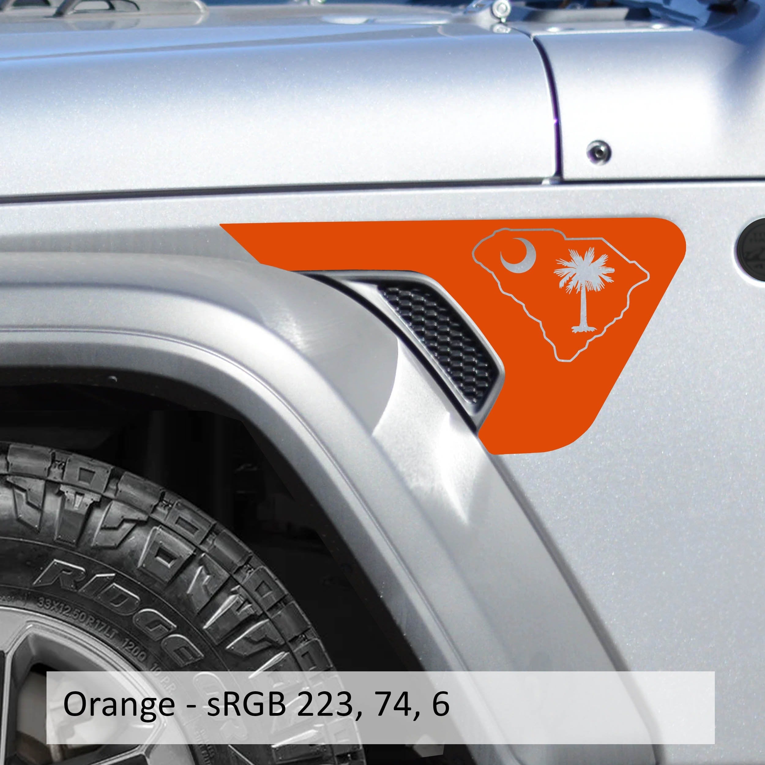 Orange South Carolina state flag fender vent decal installed on silver Jeep Wrangler JL Gladiator