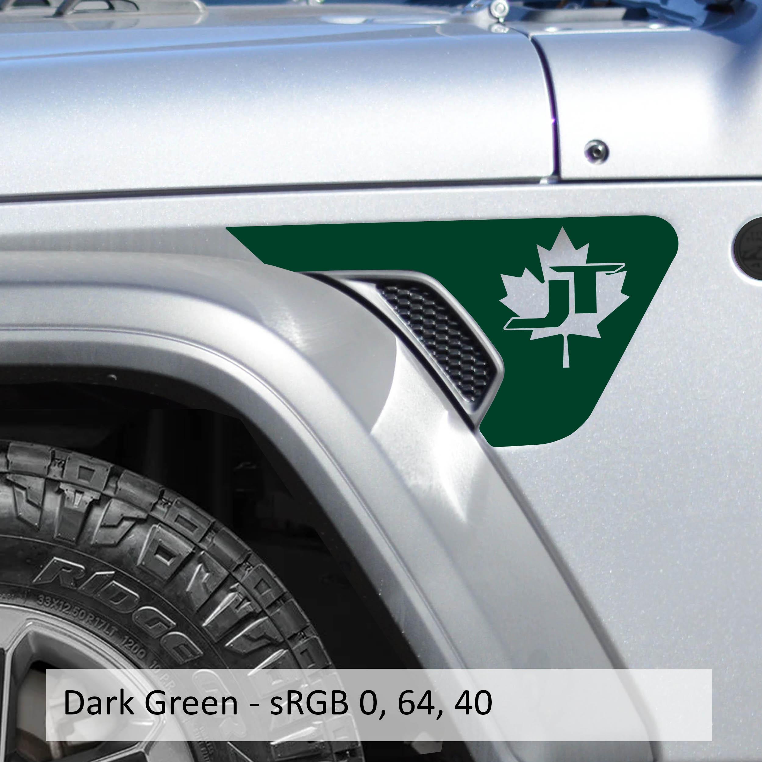Dark green JT Canadian Maple Leaf Jeep fender vent transfer decal applied to billet vent insert close-up
