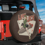 Lady Luck Bombshell spare tire cover with WWII pin-up riding bomb on red Jeep Wrangler