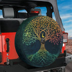 Celtic dawn tree of life spare tire cover mounted on a red Ford Bronco tailgate in a desert canyon backdrop