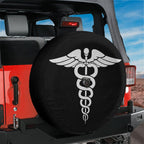 Caduceus Medical Symbol spare tire cover mounted on red Jeep rear with classic winged staff and twin serpents
