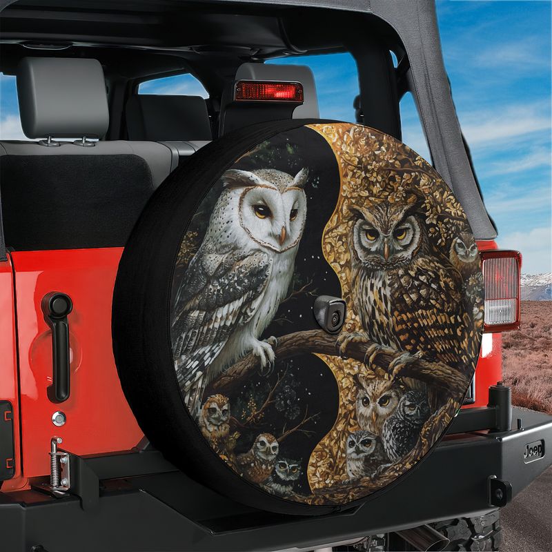Yin-Yang Owls spare tire cover product shot showing the balanced black-and-white owl artwork on the round canvas