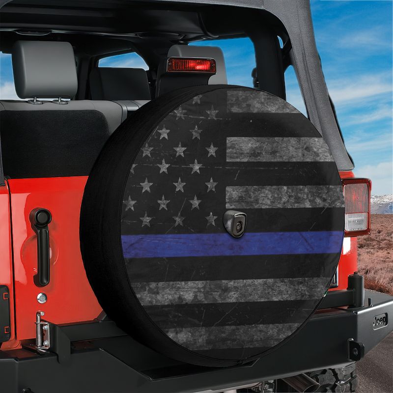 Thin Blue Line Subdued American Flag tire cover on a red Jeep Wrangler with police support flag art