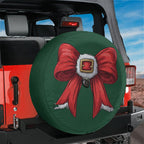 Coquette Santa bow spare tire cover on red Jeep Wrangler featuring green fabric red ribbon gold buckle