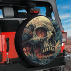 Wave of Damnation spare tire cover on red Jeep Wrangler with cracked skull and ocean wave painting