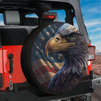 American Pride on Wheels eagle spare tire cover mounted on a black Jeep Wrangler with stars and stripes