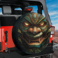 Tiki Totem of Fury spare tire cover main product render with carved wooden green tribal mask design