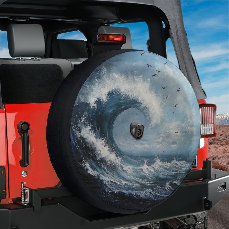 Tidal Wave spare tire cover installed on a red Jeep Wrangler hatch with painted breaking wave and seabird sky